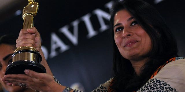 Oscar award winning Pakistani director Sharmeen Obaid-Chinoy shows her Oscar award in Karachi on March 10, 2012. Pakistan will send an entry to the Oscars for the first time in nearly 50 years as its struggling film industry shows signs of revival, the country's first Oscar winner said Monday.