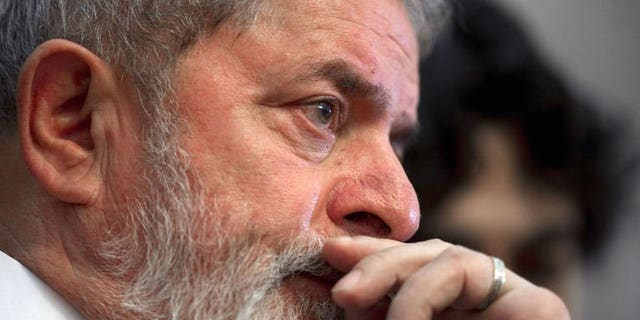 Former Brazilian President Luiz Inacio Lula Da Silva listens to a speech on October 25, 2011, in Mexico City. Lula da Silva was given the all clear here Saturday after tests showed no sign of the throat cancer he was diagnosed with two years ago.