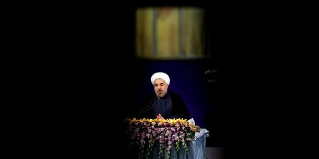 Iran's President Hassan Rowhani adresses his first news conference after taking office, in Tehran on August 6, 2013. Iran's parliament began debating on Monday the 18-member cabinet proposed by President Hassan Rowhani ahead of a vote of confidence later in the week.