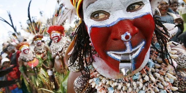 This file illustration photo shows Moki Angimb women performing during a cultural show in Mount Hagen, on August 18, 2007. Women in poverty-stricken Papua New Guinea suffer "severe brutality" with violence, including savage attacks involving knives, axes and whips, occurring in two-thirds of all families, according to a recent study.