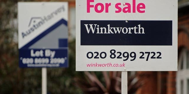 Estate agent's boards are displayed outside properties in London on December 30, 2010. Property prices across Britain are rising at their fastest pace since they hit a peak in 2006, a survey said on Tuesday.