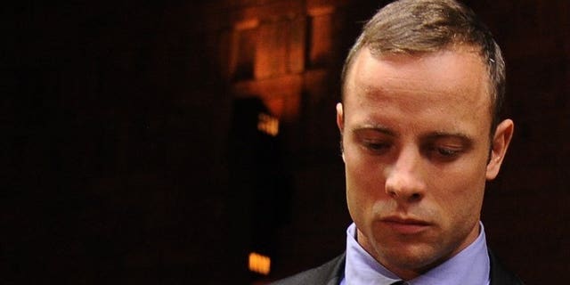 South African Olympic sprinter Oscar Pistorius appears at the Magistrate Court in Pretoria on February 21, 2013. Prosecutors said they have finalised their case against Pistorius, who is charged with the Valentine's Day murder of his girlfriend.
