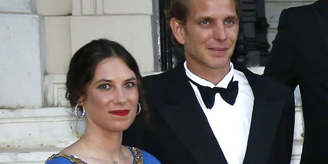 Andrea Casiraghi, the son of Princess Caroline of Hanover, and his partner Tatiana Santo Domingo as they arrive to attend the "Love Ball" in Monaco on July 27, 2013. Casiraghi, eldest son of Princess Caroline of Monaco, is to marry his Colombian girlfriend on August 31.