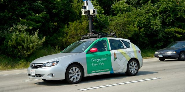 This June 28, 2012 photo shows a Google Street View vehicle as it collects imagery while driving down Interstate I-66 near Centreville, Virginia. Thai villagers on Wednesday apologised for mistaking a Google worker for a government snoop as he carried out mapping for the Internet giant's "Street View" programme in a remote area.