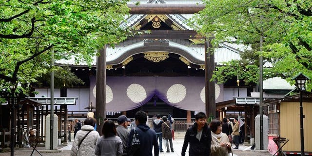 People visit Yasukuni Shrine in Tokyo on April 21, 2013. Dozens of Japanese politicians are expected to visit a controversial war shrine Thursday, in a move sure to anger China and South Korea which see it as a potent symbol of Tokyo's imperialist past.