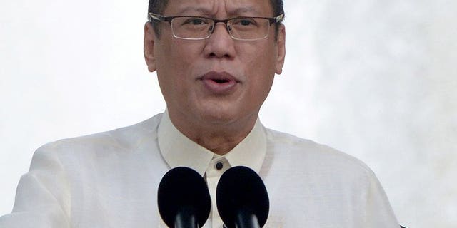 Philippine President Benigno Aquino addresses the crowd during a ceremony in Manila, on June 12, 2013. Aquino -- who previously survived a deadly assassination attempt during his struggle to the top of bare-knuckle Philippine politics -- has been laid low by his allergy to flowers.