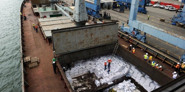 View of the North Korean vessel Chong Chon Gang at Manzanillo harbour in Colon, 90 km from Panama City on July 16, 2013. The Panama Canal authority said Thursday it will impose as much as a $1 million fine on the North Korean freighter caught with an undeclared shipment of Cuban weapons.