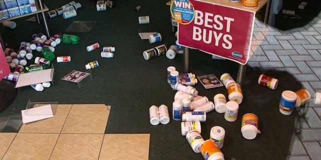 Stock lays on the floor inside a retail store in Wellington on July 22, 2013, following an earthquake a day earlier. There have been hundreds of aftershocks since the July quake.