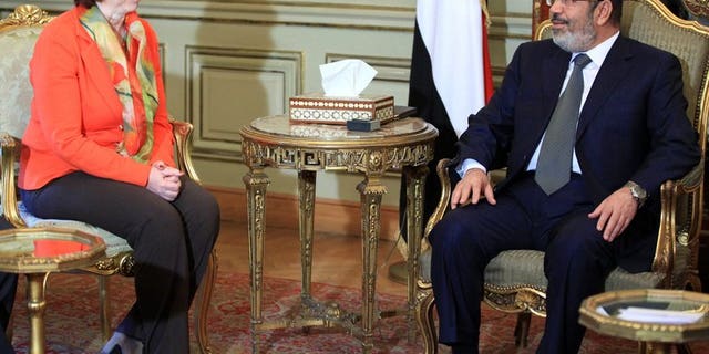 EU foreign policy chief Catherine Ashton meets Mohamed Morsi in Cairo in April. The European Union has said top officials from its 28 members will meet Monday to review the crisis in Egypt, where a military crackdown has left hundreds dead.
