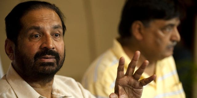 Former Indian Olympic Association (IOA) chief Suresh Kalmadi (left) and Lalit Bhanot give a press conference in New Delhi, on September 2, 2010. The IOC has sent a 43-page draft constitution that needs to be adopted by the suspended Indian Olympic Association (IOA) before its next elections in September, an Indian Olympics official has told AFP.