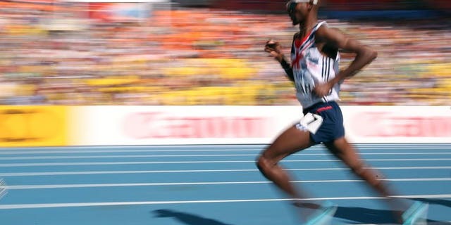 Britain's Mohamed Farah competes in Moscow on August 13, 2013. Farah added the men's 5,000m gold to his 10,000m crown at the World Athletics Championships on Friday.