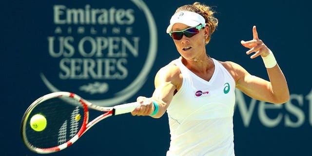 Samantha Stosur of Australia returns a shot to Jamie Hampton on August 14, 2013. The former US Open champion on Saturday said she had split with long-time coach David Taylor.