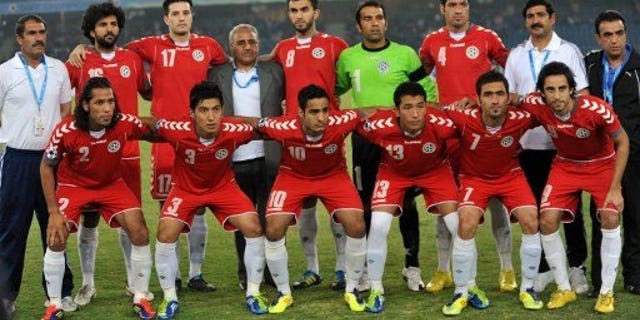 Afghanistan national football team players pose for a group photograph during the Saff championship 2011 final football tournament at Jawahar Lal Nehru Stadium (JNS) in New Delhi on December 11, 2011. Pakistan football authorities on Saturday said they were delighted at the prospect of playing their first match in Afghanistan for 36 years.