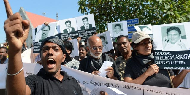 Sri Lankan journalists and media activists demonstrate, demanding investigations into over a dozen killings of editors, reporters and newspaper workers in recent years, in the capital Colombo on January 29, 2013. A Sri Lankan media rights group on Sunday accused the military of intimidating journalists who reported a deadly army crackdown on villagers protesting at contaminated water supplies.