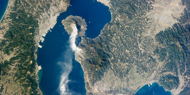 This image provided January 28, 2013 by NASA shows Japan???s Sakurajima volcano. The volcano in southern Japan erupted in spectacular fashion on Sunday, spewing an ash plume up to 5,000 metres into the air, meteorological officials said, according to a report.