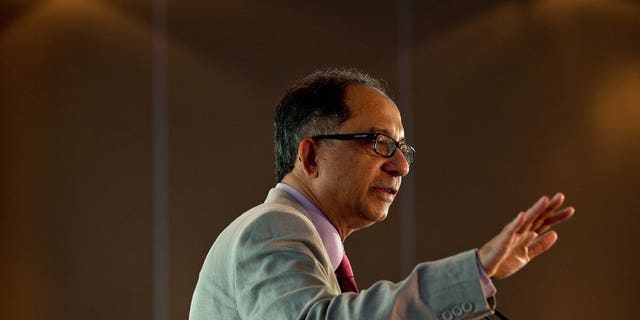 World Bank Chief Economist Kaushik Basu gestures as he presents a lecture in New Delhi on Monday. He said the gloom surrounding India's economy had been "overplayed" and the country was not in danger of a full-blown crisis.