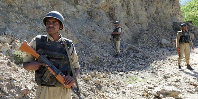 Indian security forces stand guard near the Line of Control (LOC) on May 13, 2009. India's army will take "all possible steps" to counter any ceasefire violations by Pakistan along the border between the countries, the Indian defence minister said Monday, warning not to take New Delhi's restraint for granted.