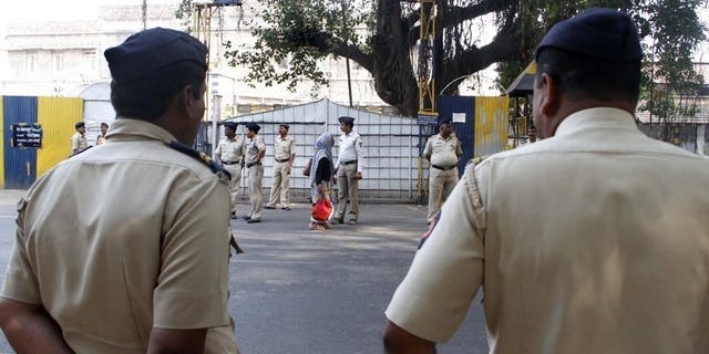 File picture shows police outside the high-security Yerwada Jail in Pune, western India, on November 21, 2012. A leading Indian rationalist, who was campaigning for a law to eradicate superstition in a country famed for its mystics and gurus, was shot dead in Pune on Tuesday, police said.