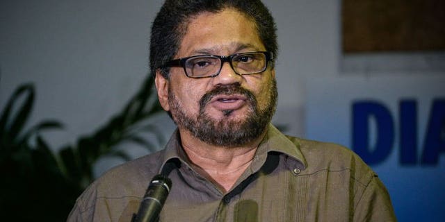 Revolutionary Armed Forces of Colombia (FARC) Commander, Ivan Marquez, gives a speech at the Convention Palace in Havana as peace talks with the Colombian government resume on August 19, 2013. The FARC guerrilla group for the first time accepted partial responsibility Tuesday for the thousands of victims of Colombia's nearly 50-year-old insurgency.