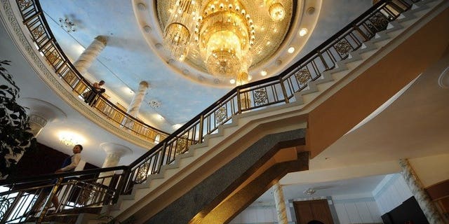 A waitress makes her way down to the main lobby of the Mount Kumgang hotel at the Mount Kumgang International tourist zone, in North Korea on September 1, 2011. South Korea agreed Tuesday to hold talks with North Korea about resuming tours to the scenic resort in the North after a five-year suspension.