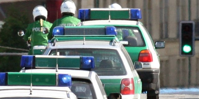 A convoy of police cars in Berlin on June 2, 2006. At least three people were killed and five others wounded Tuesday when a man opened fire in a restaurant in a small village in southern Germany, police said.