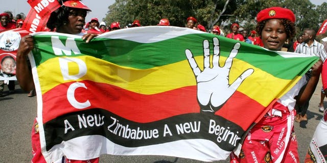Mourners at the August 14 funeral of Morgan Tsvangirai supporter Rebecca Mafikeni, who died in custody. Zimbabwean opposition leader Tsvangirai will not attend President Robert Mugabe's inauguration Thursday, aides said, insisting the vote which handed the 89-year-old another five-year term was rigged.