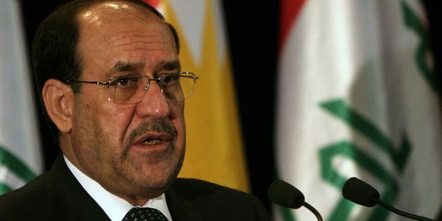 Iraqi Prime Minister Nuri al-Maliki speaks during a joint press conference with Kurdish regional president Massoud Barzani in the northern Iraqi Kurdish city of Arbil on June 9, 2013. Maliki is to visit India, officials said Wednesday, to push for investment in much-needed reconstruction as New Delhi looks to secure critical energy supplies.