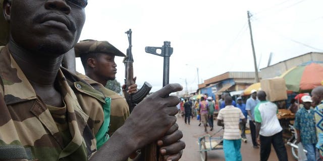 Members of the Multinational Force of Central Africa patrol on July 20 in Bangui. Armed clashes erupted in Bangui as the new president's forces tried to disarm supporters of former leader Francois Bozize, a military source said on Wednesday.