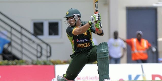 Pakistan batsman Umar Akmal in action at Beausejour Cricket Ground in Gros Islet on July 19, 2013. Pakistan's talented young batsman Akmal will see a neurologist for further testing after suffering a suspected seizure which forced his withdrawal from the Zimbabwe tour, an official said Wednesday.