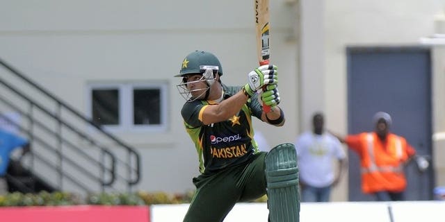 Pakistan batsman Umar Akmal in action at Beausejour Cricket Ground in Gros Islet on July 19, 2013. Pakistan's talented young batsman Akmal will see a neurologist for further testing after suffering a suspected seizure which forced his withdrawal from the Zimbabwe tour, an official said Wednesday.