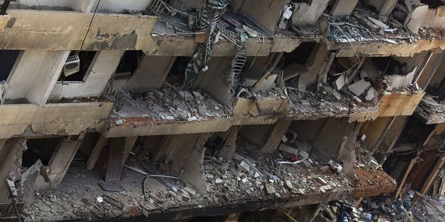 Destruction on August 16, 2013, following a deadly car bomb attack the previous day in Beirut. The Lebanese army is fighting a "total war" against terrorism whose aim is "to provoke sectarian strife" in the small Mediterranean country, army chief General Jean Kahwaji said Wednesday.