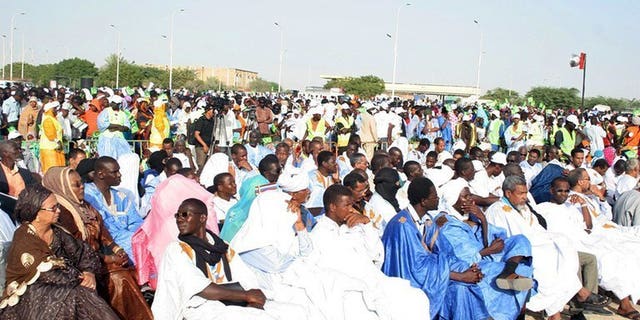 Thousands of supporters of the Mauritanian opposition attend a meeting in Nouakchott on June 23, 2013. Mauritania announced a six-week postponement of its October 12 elections on Thursday after a coalition of opposition parties said it would boycott in a bid to cause the vote to fail.