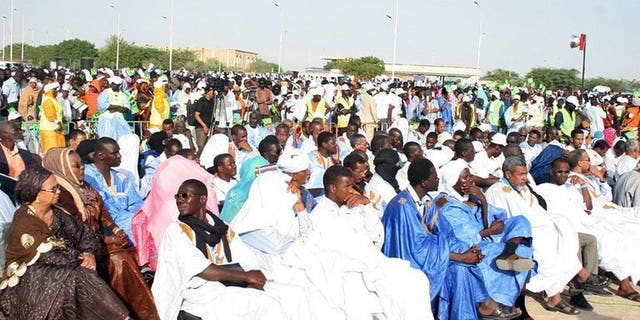 Thousands of supporters of the Mauritanian opposition attend a meeting in Nouakchott on June 23, 2013. Mauritania announced a six-week postponement of its October 12 elections on Thursday after a coalition of opposition parties said it would boycott in a bid to cause the vote to fail.