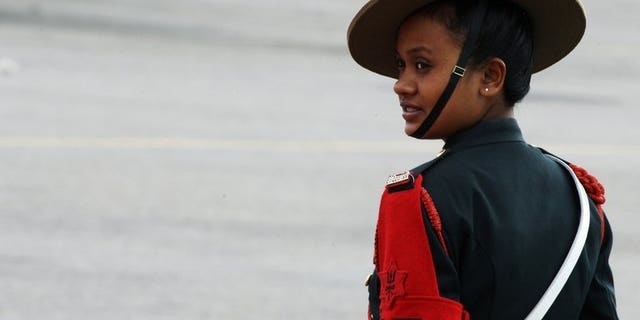 A Nepalese army cadet waits for the prime minister to arrive at the Tribhuvan International Airport in Kathmandu on July 18, 2009. Nepal has urged airlines flying into the country's only international airport to use smaller planes after holes and cracks were discovered on the runway, a top aviation official said Thursday.