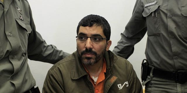 Palestinian engineer Dirar Abu Sisi attends a court session in Beersheva on April 4, 2011. The Palestinian from Gaza, who was snatched from Ukraine and is being held in an Israel prison, has begun refusing food, a prison spokeswoman said on Thursday.