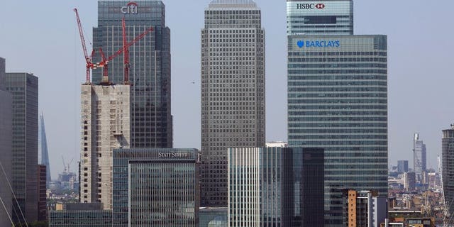 View of London's Canary Wharf business district. London shares opened mixed on Friday ahead of revised second quarter GDP figures later in the day, dealers said.