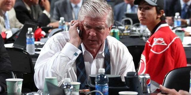 Then Toronto Maple Leafs General Manager Brian Burke, pictured at Consol Energy Center in Pittsburgh, Pennsylvania, on June 23, 2012. Burke, who helped assemble the 2007 Anaheim Ducks' Stanley Cup winning team, has been hired as the president of hockey operations for the Calgary Flames, according to the team.
