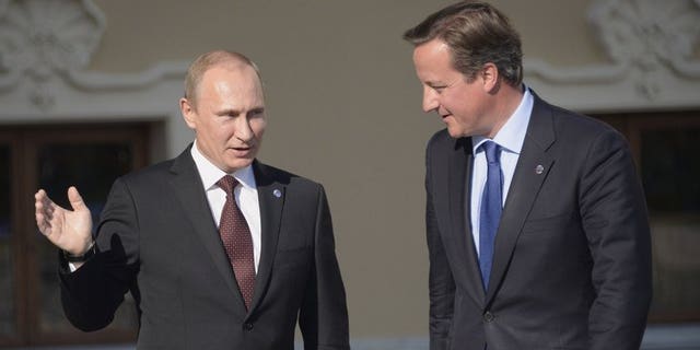 Vladimir Putin, David Cameron in an undated photo