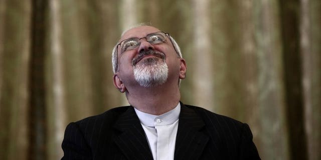 Iranian Foreign Minister Mohammad Javad Zarif attends a ceremony in Tehran on September 1, 2013. Zarif said on Facebook that Tehran condemns the World War II Nazi massacre of the Jews, in stark contract to Holocaust denials by former president Mahmoud Ahmadinejad.