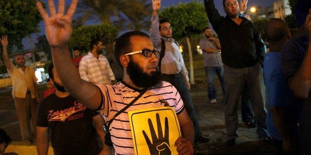 Hundreds of Muslim Brotherhood members demonstrate in Cairo on September 3, 2013. Egypt is expected to announce soon whether or not to dissolve an NGO linked to the Muslim Brotherhood amid allegations it operates as a front for the Islamist group.