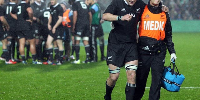 New Zealand's Richie McCaw is helped off the field during the Rugby Championship match against South Africa on September 7, 2013. The Springboks landed in Auckland Monday for "the ultimate challenge" against the All Blacks next weekend, claiming they remain the underdogs despite New Zealand losing McCaw.