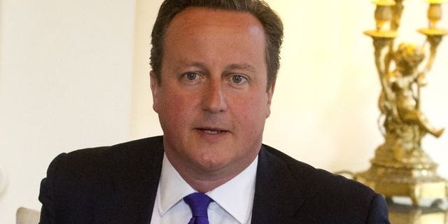 British Prime Minister David Cameron is seen in 10 Downing Street in central London on August 30, 2013.