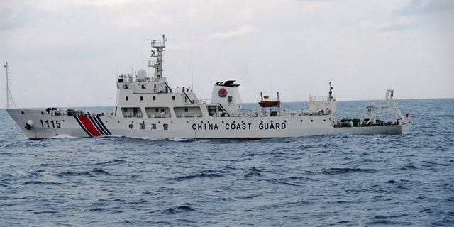A Chinese coast guard ship near the disputed islets known as the Senkaku islands in Japan and Diaoyu islands in China, in a photo taken and released by the Japan Coast Guard on September 5, 2013.