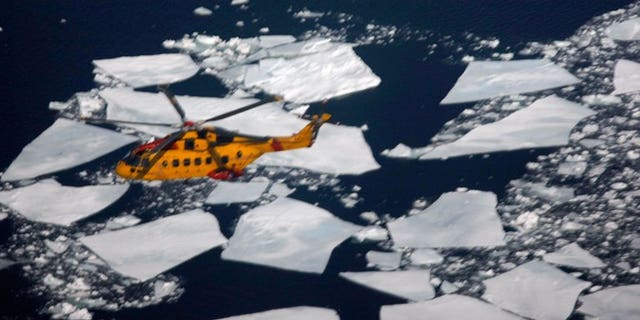 A Canadian Coast Guard search and rescue helicopter is seen on March 29, 2008 in the Gulf of Saint Lawrence.
