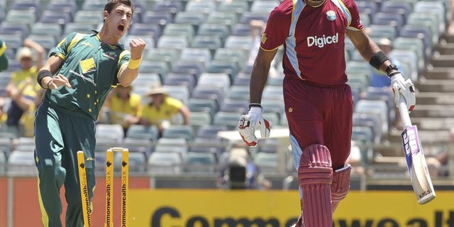 Australia's Mitchell Starc (L) celebrates during an ODI against the West Indies at the WACA ground on February 1, 2013. Perth's WACA ground will be without a Test match when India tour Australia during the 2014-15 season, Cricket Australia has announced.