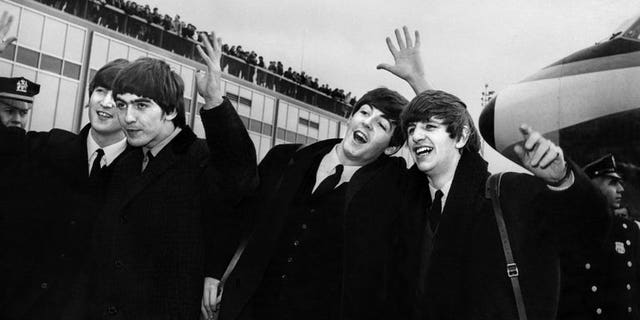 The Beatles -- from left to right, John Lennon, Ringo Starr, Paul McCartney and George Harrison -- arrive at John F. Kennedy Airport in New York on February 7, 1964. A box set of previously unreleased recordings and studio chat by The Beatles including early hits and cover versions is to be released later this year, their record company said Friday.