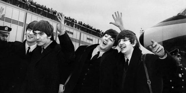 The Beatles -- from left to right, John Lennon, Ringo Starr, Paul McCartney and George Harrison -- arrive at John F. Kennedy Airport in New York on February 7, 1964. A box set of previously unreleased recordings and studio chat by The Beatles including early hits and cover versions is to be released later this year, their record company said Friday.