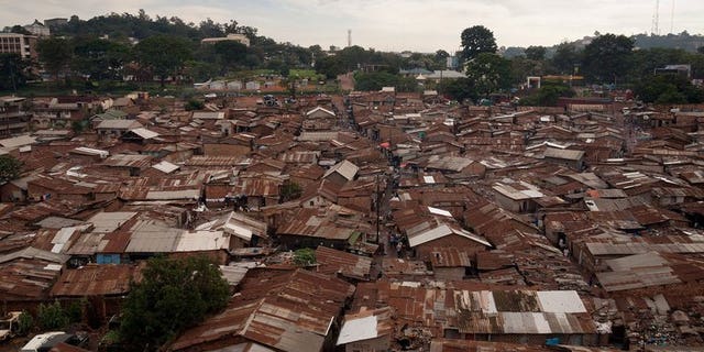 A general view of the Kataanga slum in the Ugandan capital, Kampala, on December 18, 2012. A Ugandan court has given a symbolic six-hour jail term to a teenage girl who killed her rapist father in a case that has drawn a wave of public sympathy.
