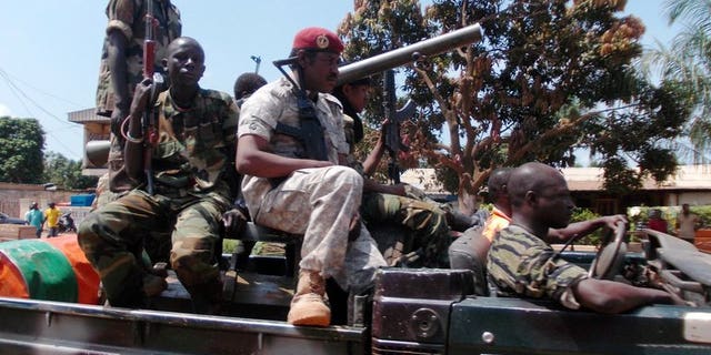 Seleka soldiers leave the Central African Republic capital Bangui on September 10, 2013 to reinforce troops in the western city of Bossangoa. The Central African Republic's new President Michel Djotodia said Friday he is dissolving the Seleka rebel group that overthrew the country's former leader and brought him to power.