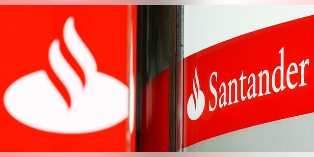British police said they have charged four men over a plot to remotely take control of a computer at a branch of Santander bank and steal millions of pounds